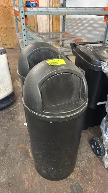 Rubbermaid round poly trash cans. Features black polyethylene construction and dome tops with swing doors. 40"H.