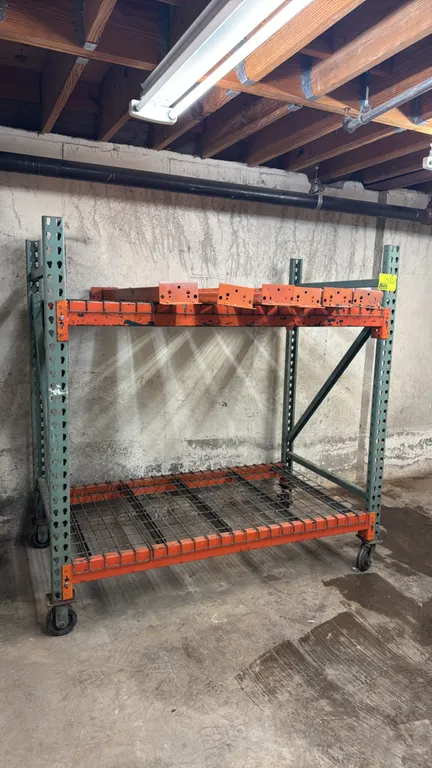 Interlake portable racking. Features teardrop uprights, (2) tiers with wire mesh decking, and (6) pallet support crossbars. Dimensions: 60" x 36" x 65