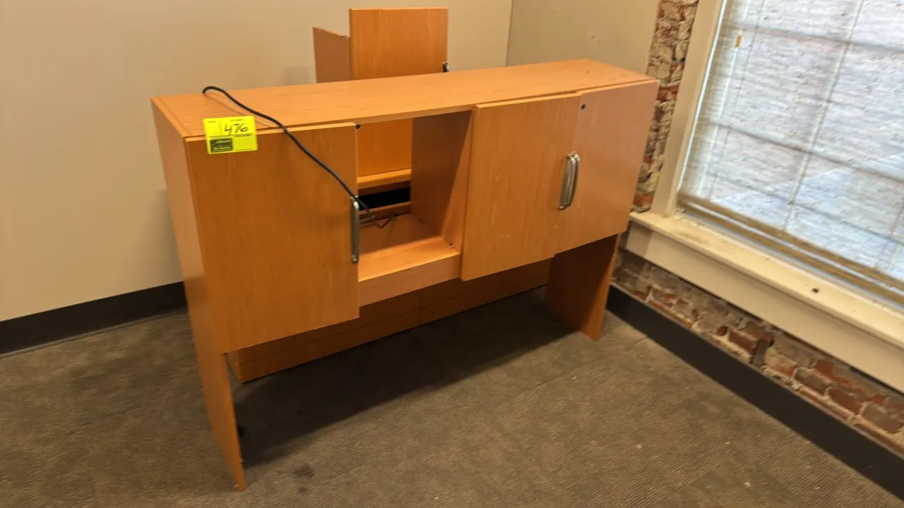 Knoll wood laminate desk components. Includes an overhead storage hutch with cabinet doors, a lower drawer credenza unit, a fabric tackboard panel, an