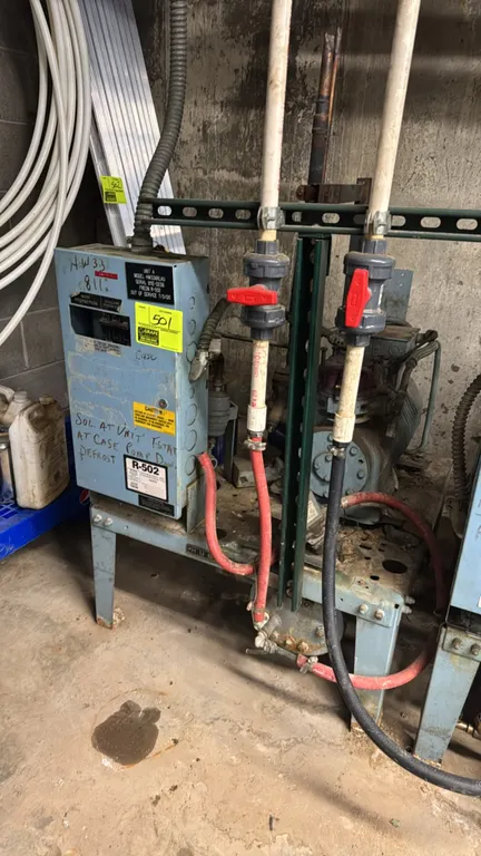 1981 Hussmann HW336RLKU low-temp refrigeration compressor rack. Features a Copeland 3 HP semi-hermetic compressor, integrated electrical control panel
