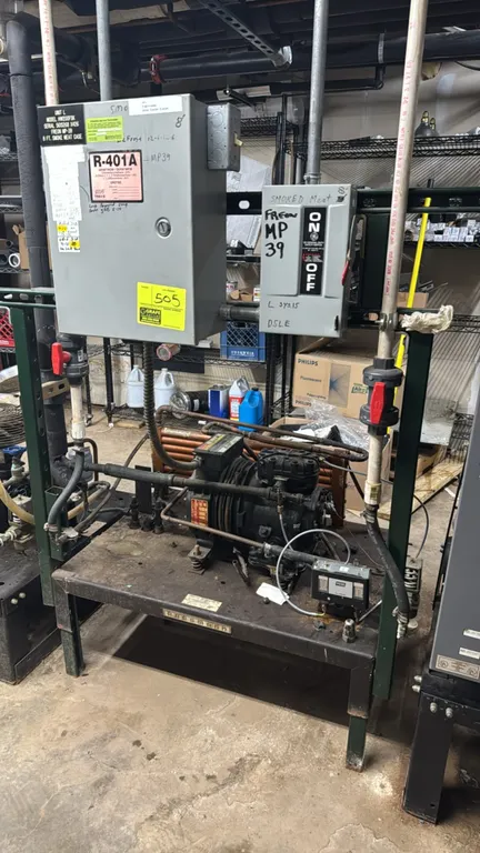 Hussmann HW200FSK medium-temp refrigeration compressor rack. Features a Copeland 2 HP semi-hermetic compressor, electrical control box, disconnect swi