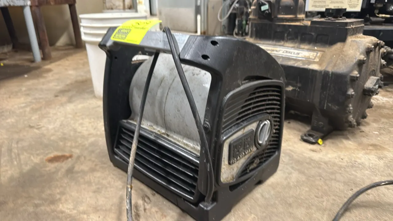 Portable air mover blower fan. Features a 3-speed rotary control switch, dual auxiliary power outlets (10A max), and an integrated top carry handle.