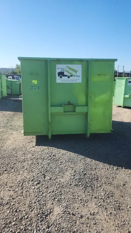 20-yard hooklift roll-off dumpster container. Features rear double barn doors, integrated bottom roller, and front lift hook with 36" hook height. Ide