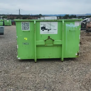 15-yard hooklift roll-off dumpster container. Container #1403. Features 36" hook height, rear double barn doors with dual latches, and bottom roller. 