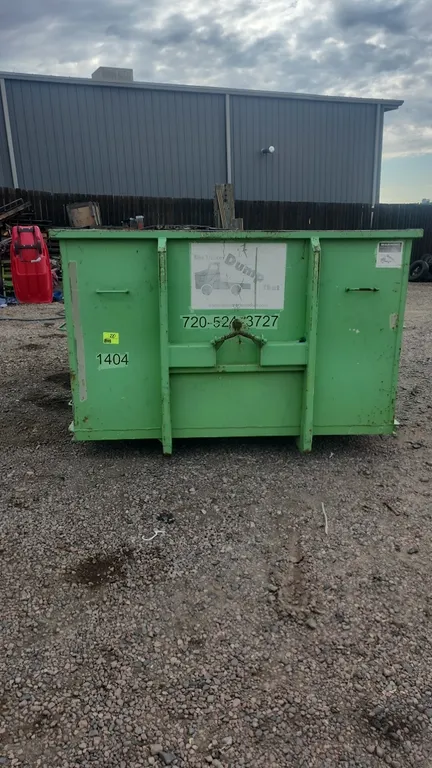 15-yard hooklift dumpster container (#1404). Features rear double barn doors, front hooklift attachment, 36" hook height, and bottom roller. Dimension