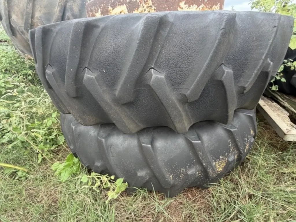 2 Firestone tires (2 have rims) 18.4-38