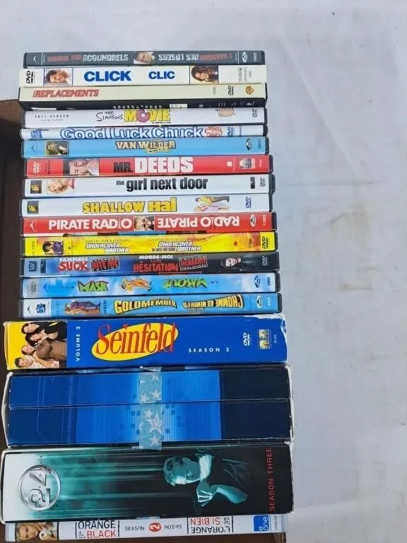 Assortment of Movie and TV Show Discs
