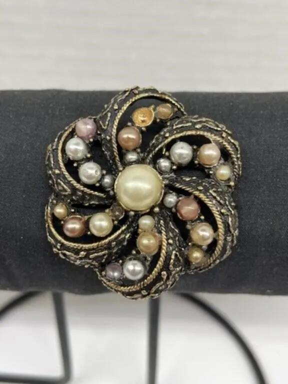Modern Brooch with Pearl-like Stones Mounted on a