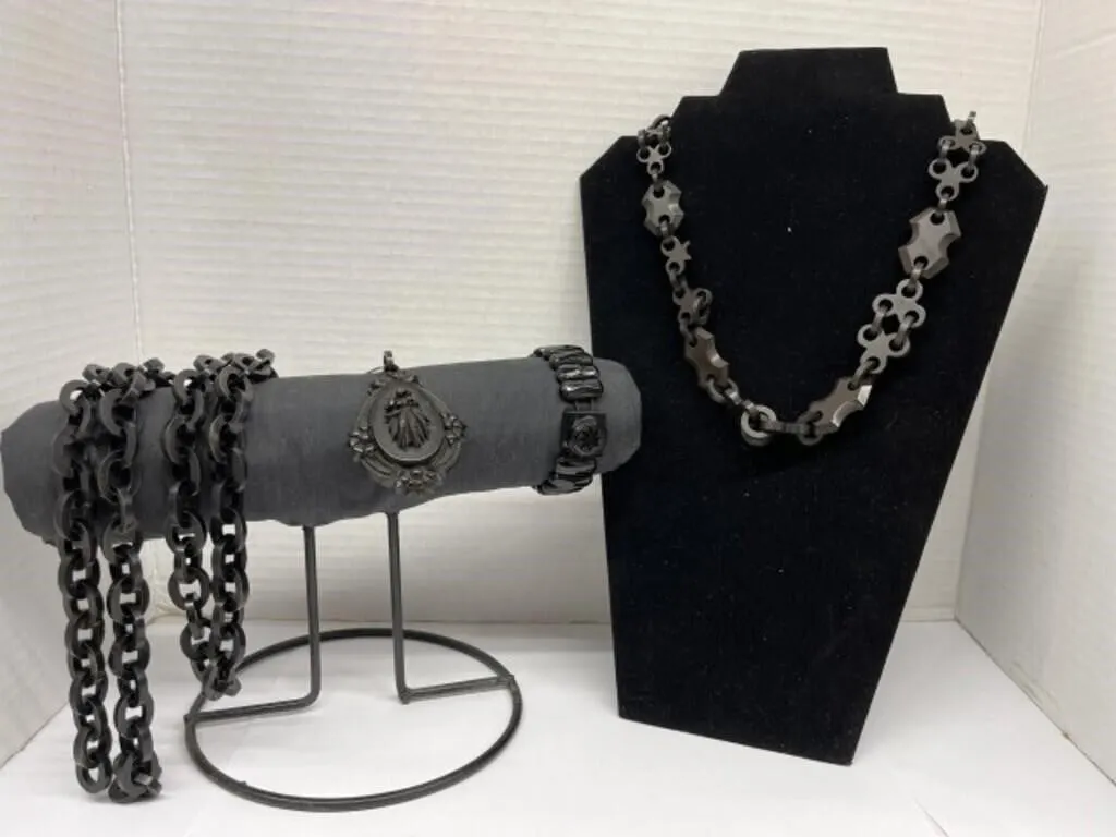 2 Modern Black Plastic Necklaces Together with a