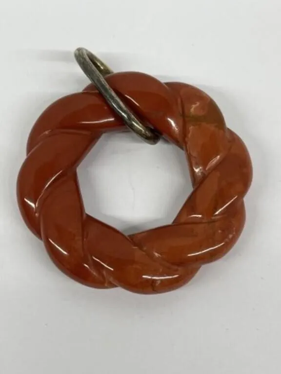 Pendant Carved in the Round in Stone
