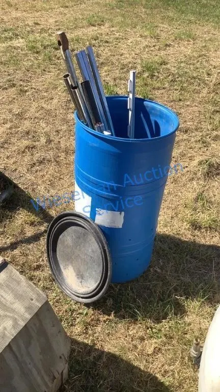 BARREL WITH METAL RODS, POSTS, ETC