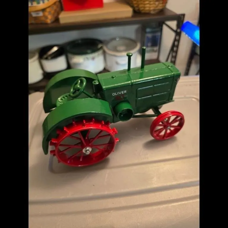 Vintage Green Oliver Tractor Toy with Red Wheels
