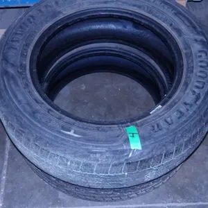 2 - 215/65/R16 GOODYEAR ALL SEASON TIRES (APPROX. 25% LEFT)