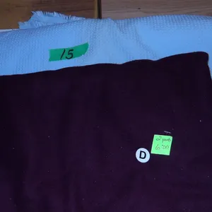 UNCLAIMED STORAGE:  PURPLE FELT FABRIC (APPROX 2 YARDS) & BLUE FABRIC (APPROX. 60" X 30")