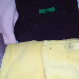 UNCLAIMED STORAGE:  4 BUNDLES OF FABRIC