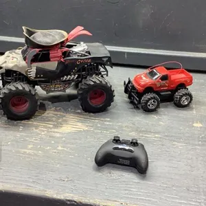 BOX W/NEW BRIGHT  (2) RC TRUCKS  + (2) CONTROLLERS