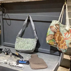 BOX W/CHI FLAT IRON, BEAUTIQUE CURLING IRON, HAIR CLIPS, HOT WATER BOTTLE W/COVER, (2) BAGS , BLUE LIGHT GLASSES