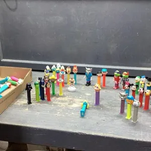 A GOOD ASSORTMENT OF PEZ DISPENSERS