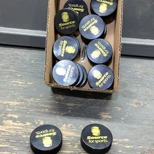 BOX WITH 17 HOCKEY PUCKS “SOURCE FOR SPORTS”