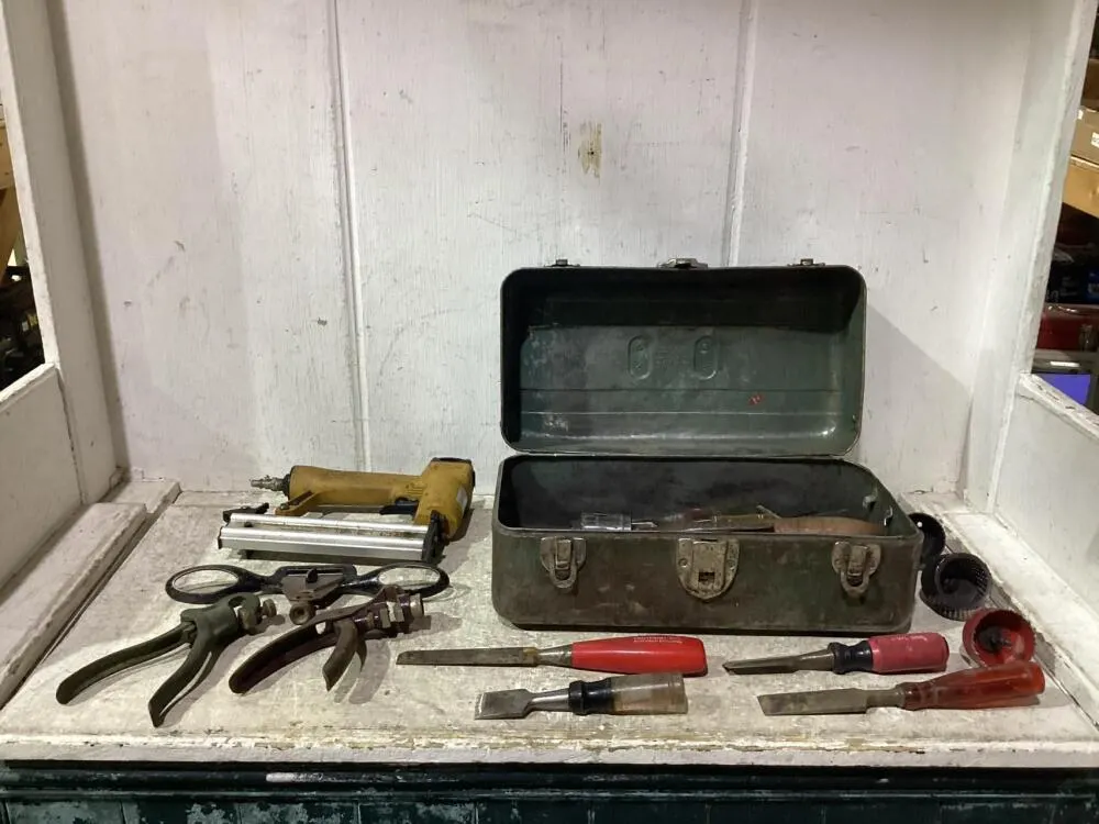 TOOL BOX W/ CHISELS, BRAD NAILER, HOLE SAW BITS & MISCELLANEOUS
