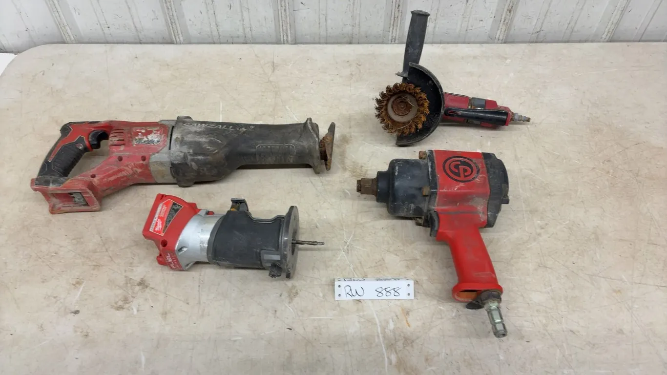 Milwaukee Sawzall, Milwaukee Compact Router, Chicago Pneumatic Impact Wrench, and Chicago