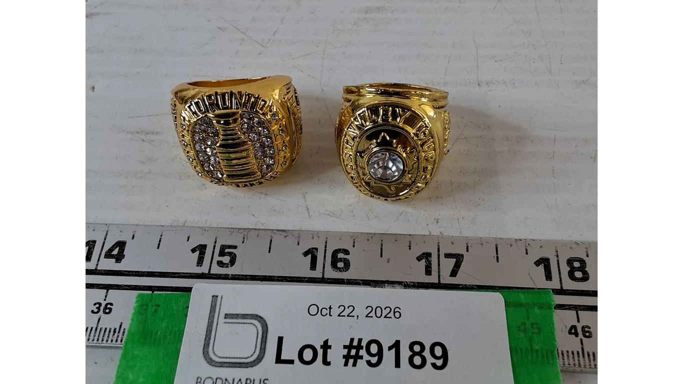 (2) Gold-Toned Replica NHL Hockey Championship Rings, Sizes 11 and 10 Maple Leaves