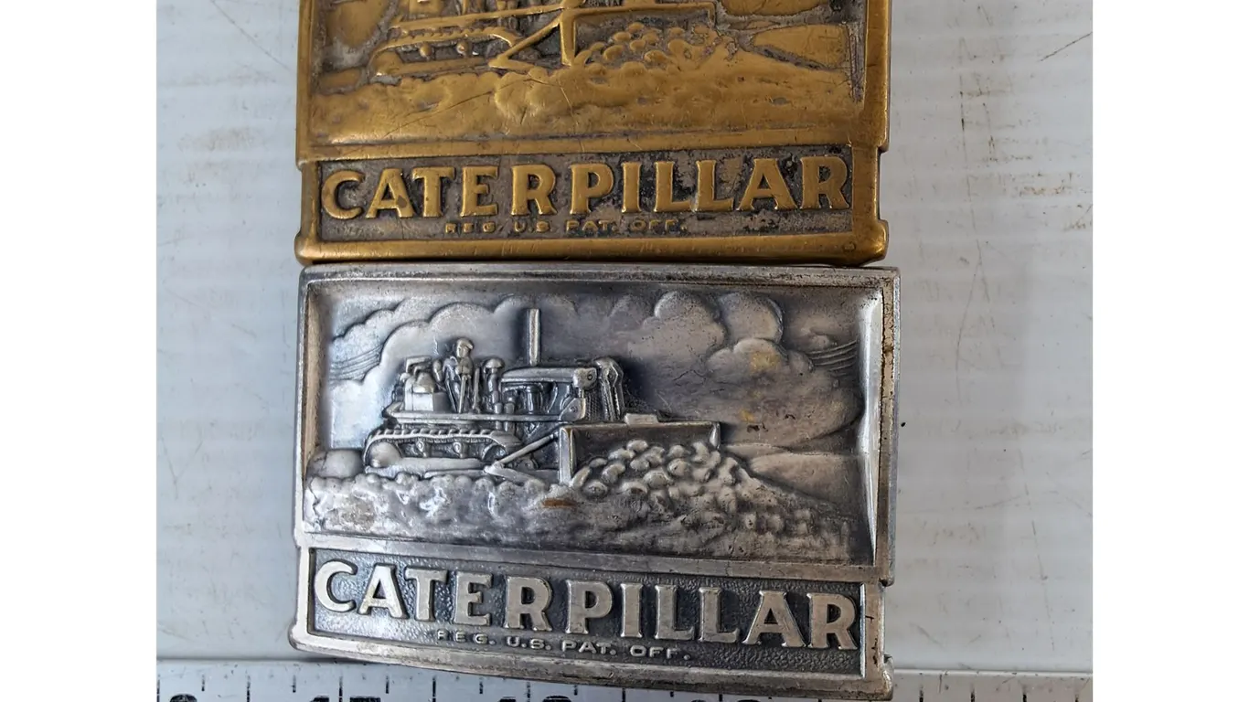 (2) Caterpillar Belt Buckles