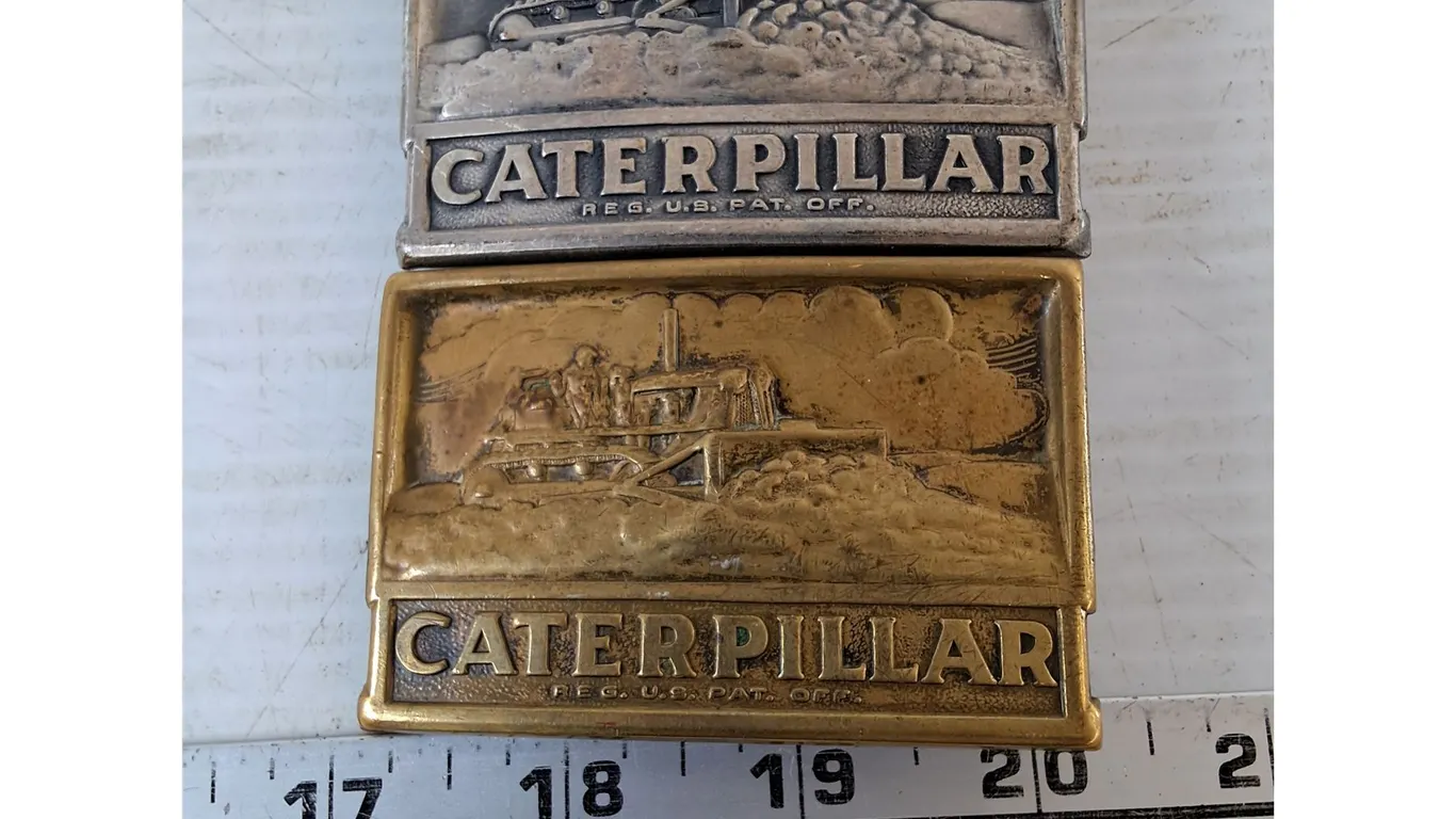 (2) Caterpillar Belt Buckles