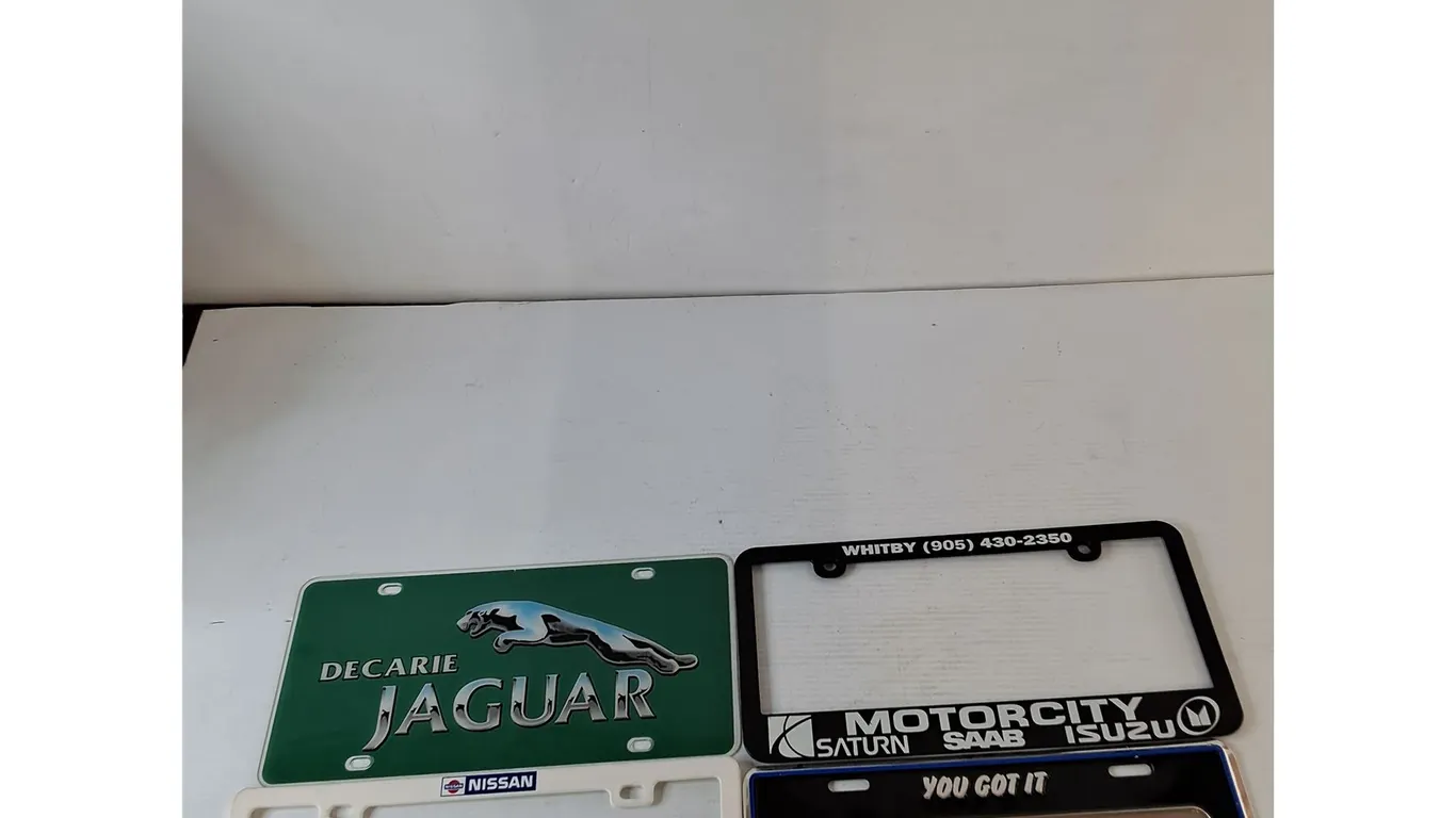 (2) Promotional License Plate, (2) License Plate Frames, Nissan Jaguar, Park, Motorcity