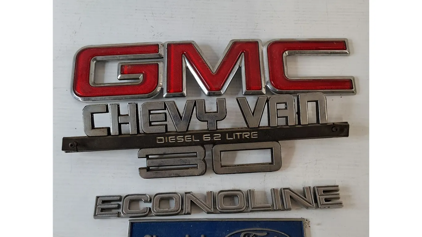(4) Car Emblems- Ford Chassis, Econoline, Chevy Van, GMC