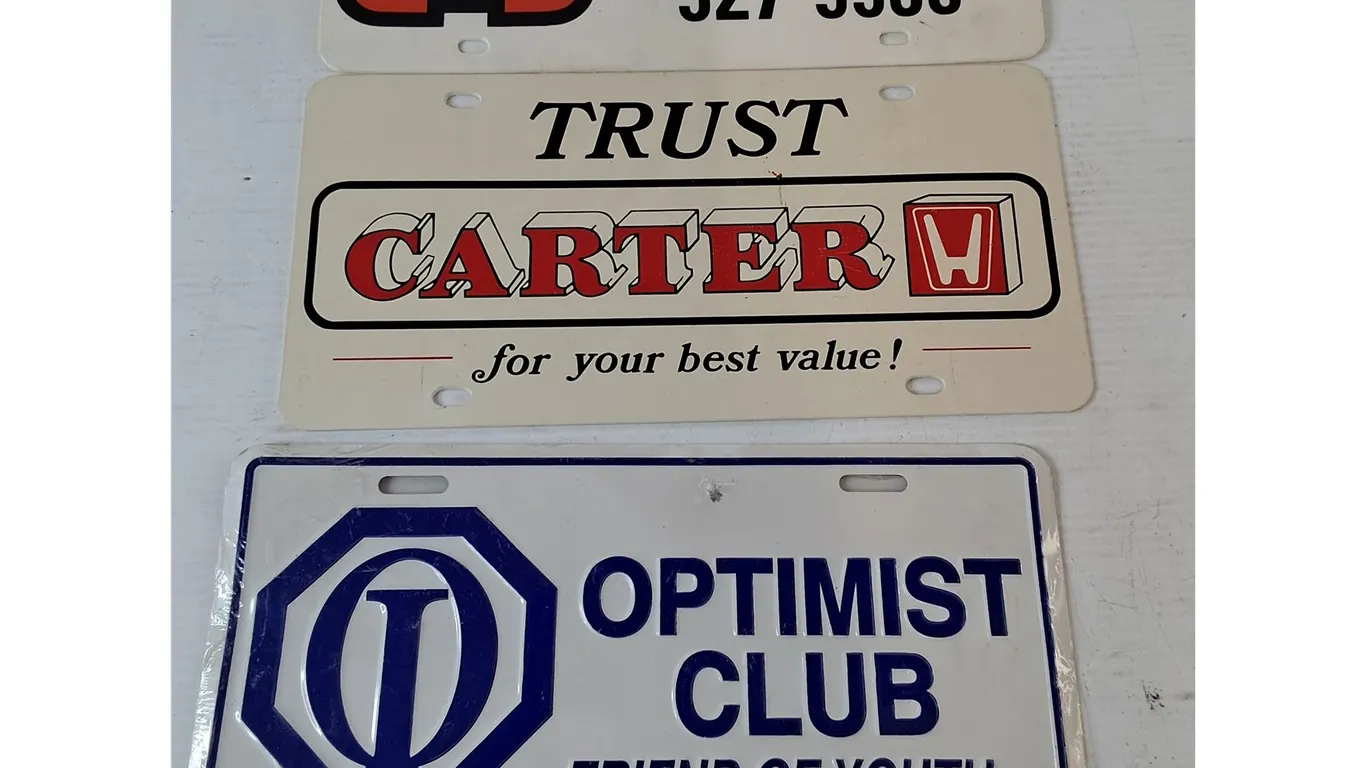 (3) License Plate Advertisements- Optimist Club, Trust Carter, French Natural Gas Service