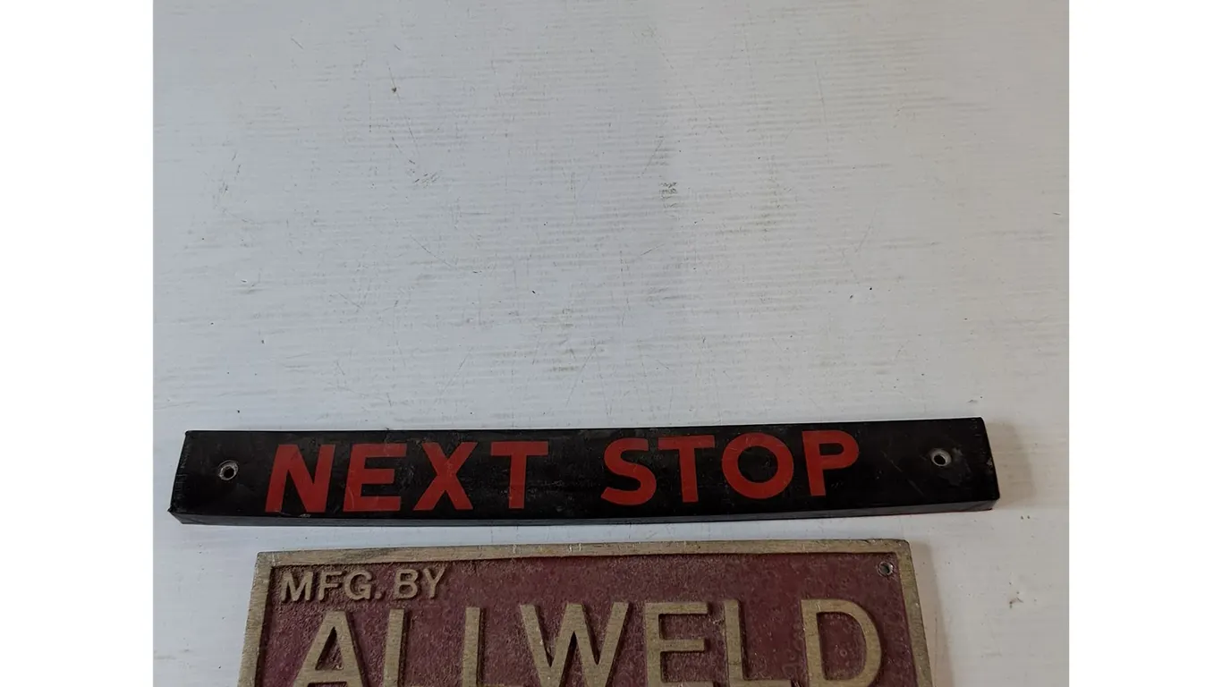 (2) Signs- Allweld and Next Stop