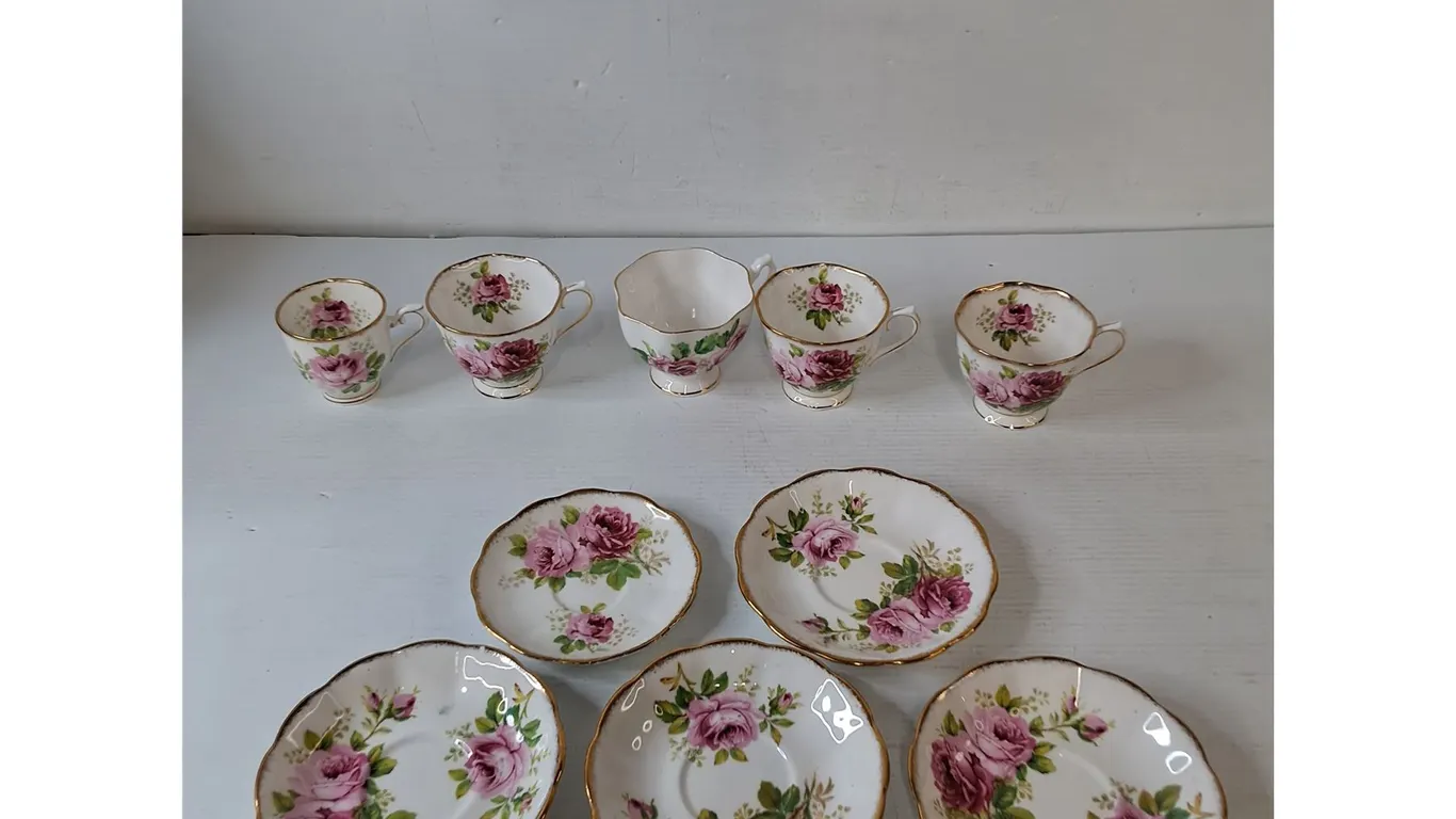 (4) Royal Albert American Beauty Porcelain Teacups and (5) Saucers, (1) Queen Anne Teacup