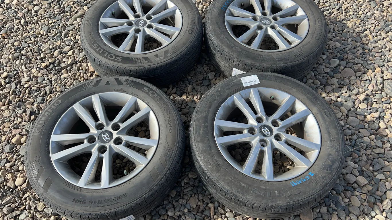 4 - 205/65R16 Kumho Tires with Rims