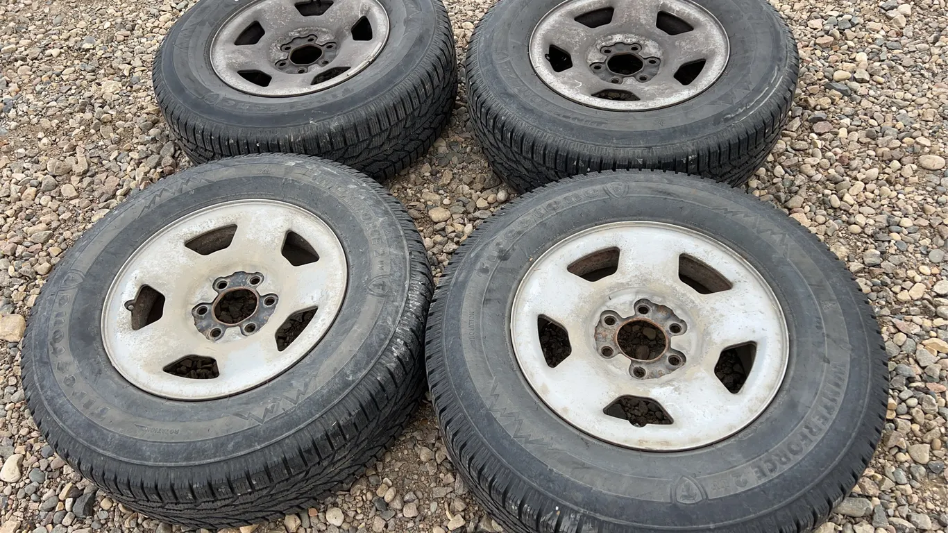 4 - 265/70R17 Firestone Winter Tires & Rims
