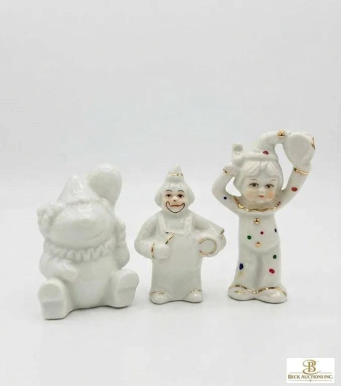 Porcelain Clown Figurines Trio with Gold Trim and Polka Dots