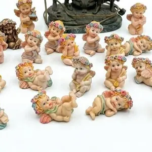 18 Porcelain Cherub Figurines with Flower Crowns