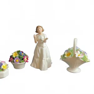 Royal Doulton Welcome HN3764 Figurine with Three Floral Porcelain Ornaments