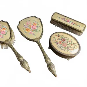 Four-Piece Vanity Set With Embroidered Floral Motifs and Ornate Handles