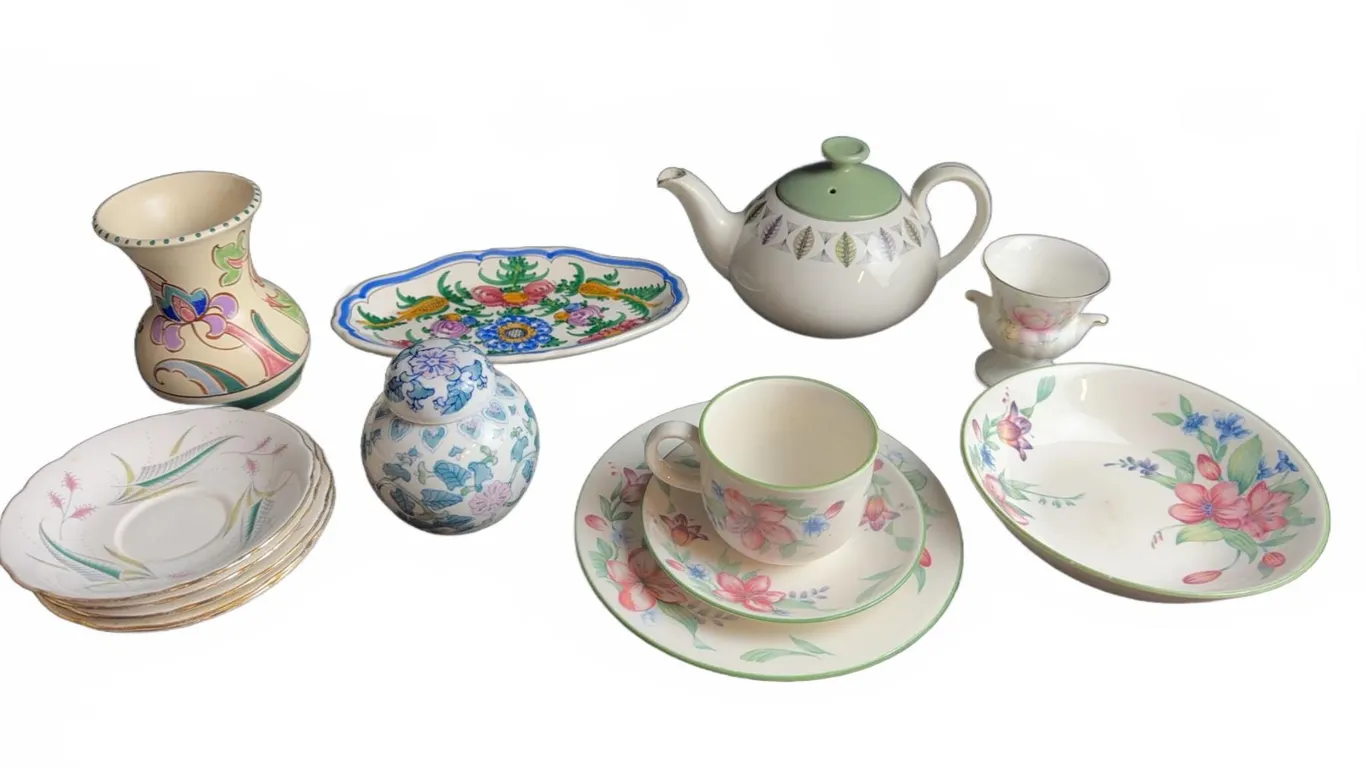 Floral China and Porcelain Tableware Including Teapot, Plates, Bowls, and Vases