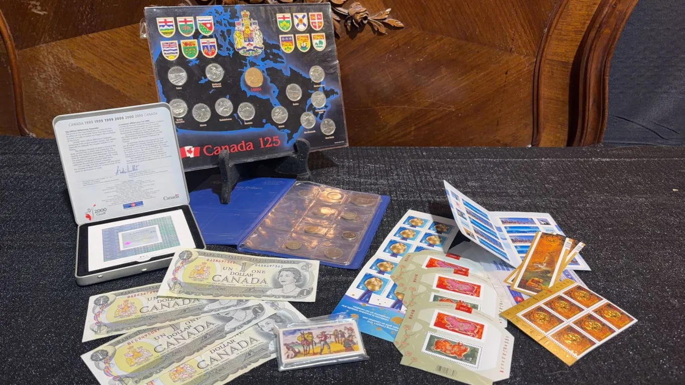 Canada 125 Coin Set, Canadian One Dollar Bills, Assorted Mint Stamps and Wild West Card