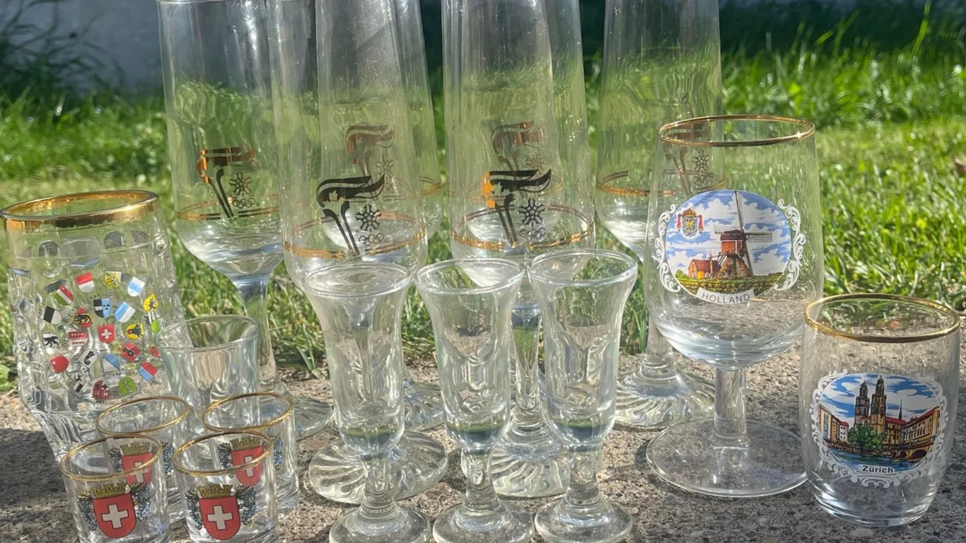 Set of Souvenir Glassware Including Switzerland and Holland Motifs