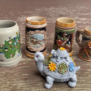 Four Swiss and German Beer Steins and Decorative Turtle Trinket Box