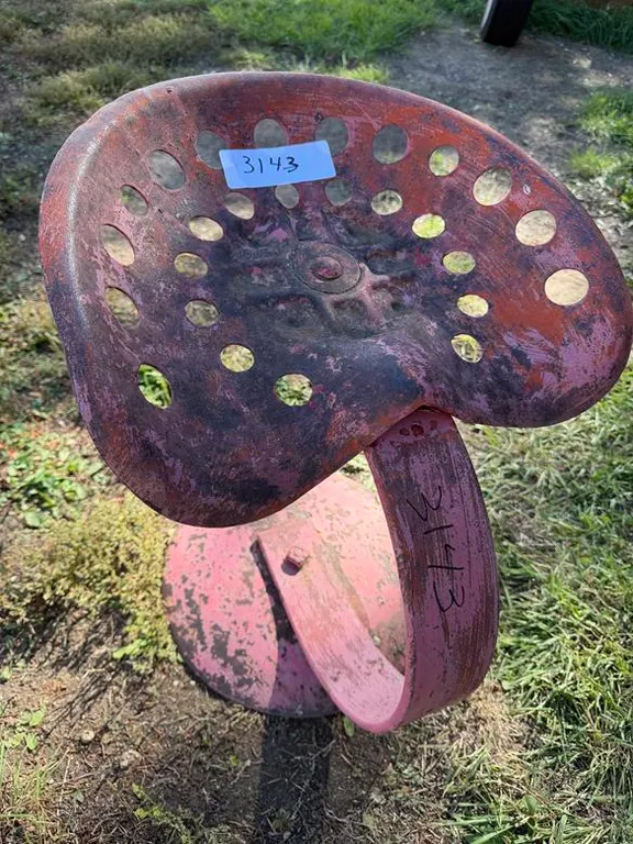 Metal Tractor Seat on Post