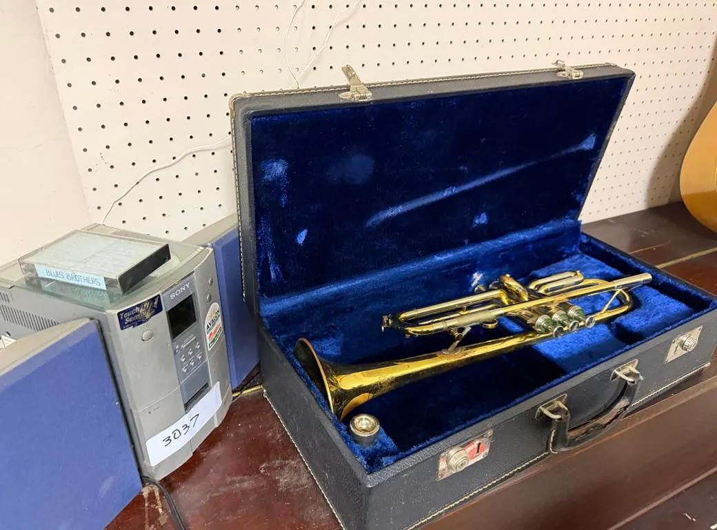Trumpet in Case and Sony Player
