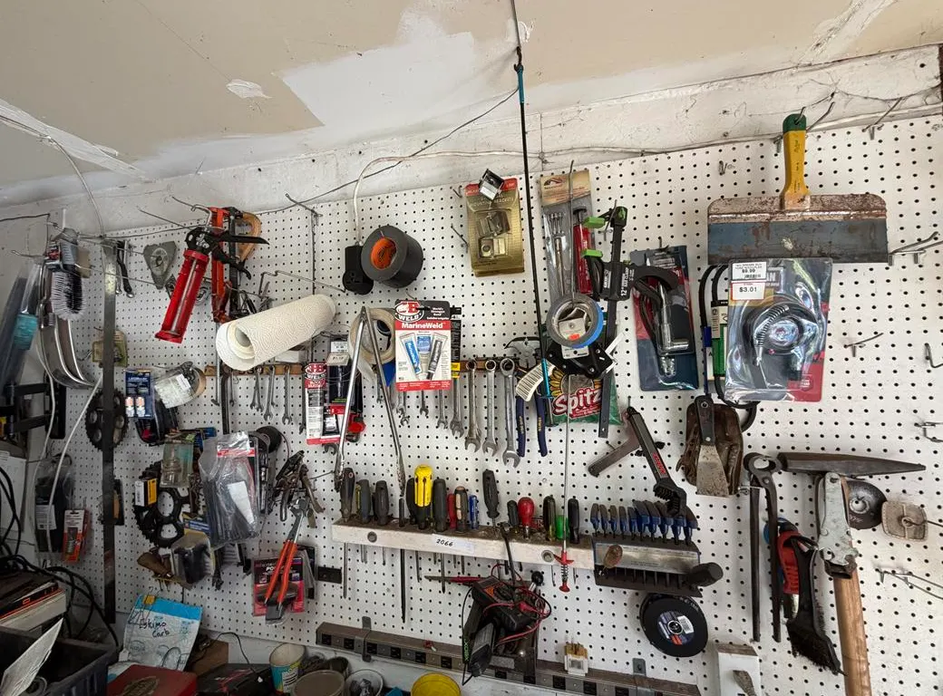 Hand Tools and Hardware on Peg Board
