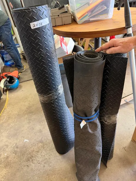 (2) Rubber Diamond Floor Rolls and (1) Mat