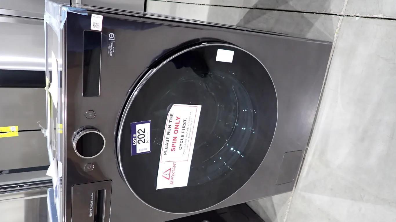 LG WM6998HBA Black Stainless 5.7 CUFT Washer/Dryer Combo- NOTE: PLEASE INSPECT.