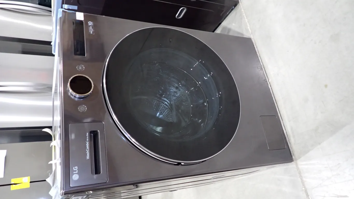 LG WM6998HBA Black Stainless 5.7 CUFT Washer/Dryer Combo- NOTE: PLEASE INSPECT.