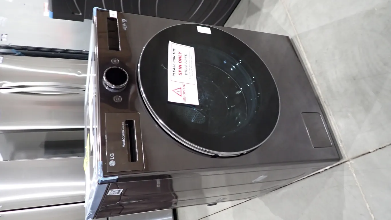 LG WM6998HBA Black Stainless 5.7 CUFT Washer/Dryer Combo- NOTE: PLEASE INSPECT.